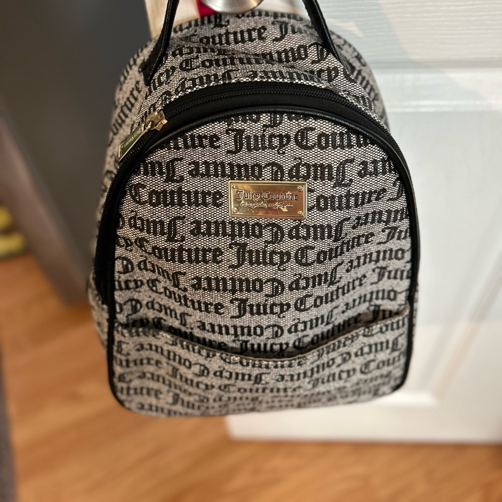 Juicy couture back pack purse used, clean no call out